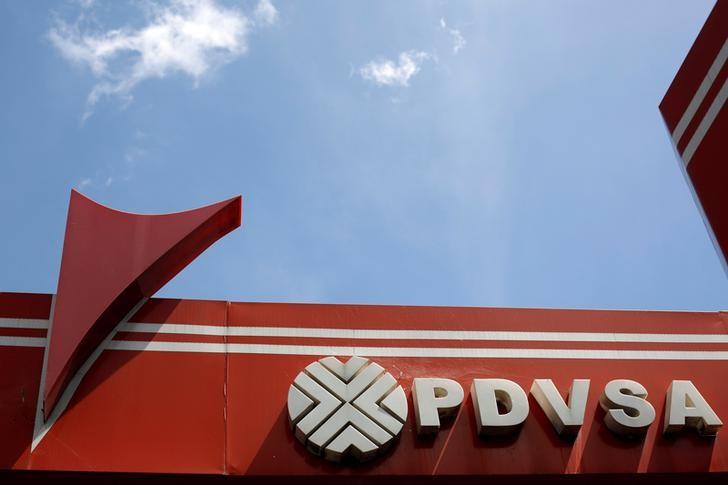 The logo of the Venezuelan state oil company PDVSA is seen at a gas station in Caracas