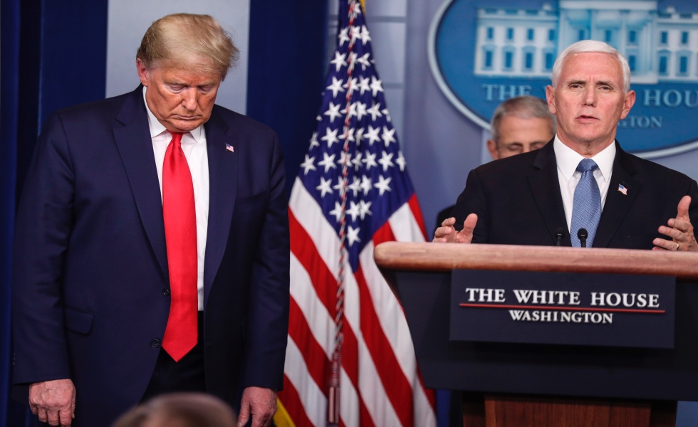 Washington (United States), 24/03/2020.- Vice President Mike Pence speaks as President Donald Trump listen during a press conference with members of the coronavirus task force in the Brady Press Briefing Room of the White House, Washington, DC, USA, 24 March 2020. (Estados Unidos) EFE/EPA/Oliver Contreras / POOL