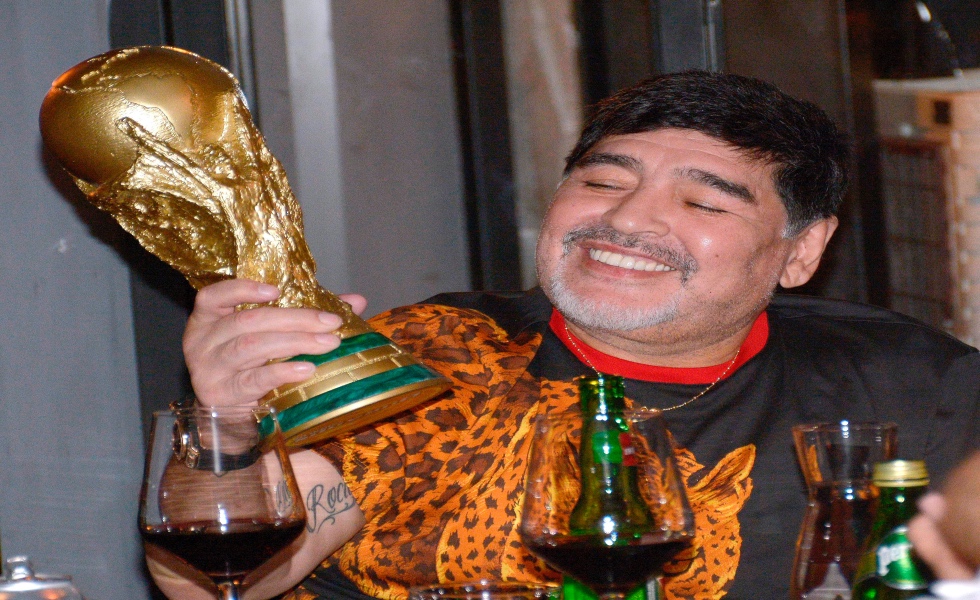 A file picture dated on 06 November 2018 (issued on 25 November 2020) shows to former Argentinian soccer player Diego Armando Maradona holding a replica of the World Cup trophyin Culiacan city, Mexico. Diego Maradona, died on 25 November 2020 at the age of 60 according to his agent and friend Matias Morla. EFE/ Juan Carlos Cruz